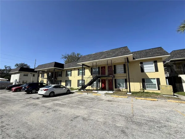 a view of a car park in front of house