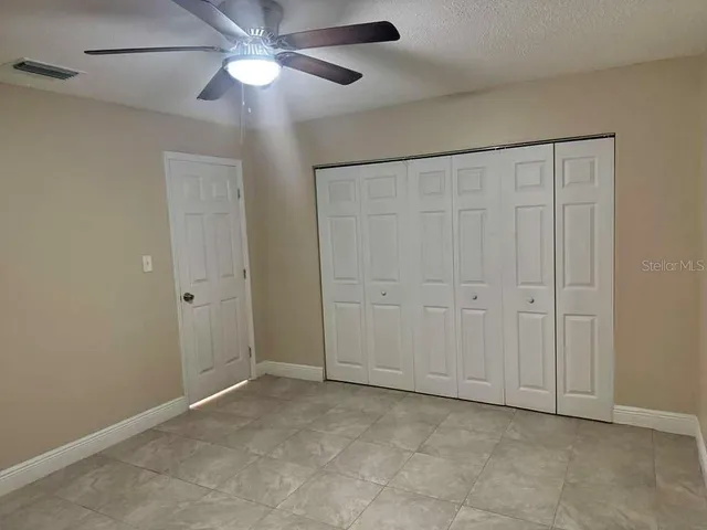 a bathroom with a toilet a sink and bathtub