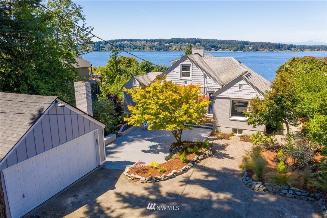 4411 Sunset Beach Road West University Place, WA 98466 - Photo 1 of 39 a view of a terrace with sitting area