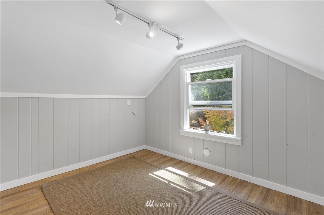 4411 Sunset Beach Road West University Place, WA 98466 - Photo 19 of 39 an empty room with a window