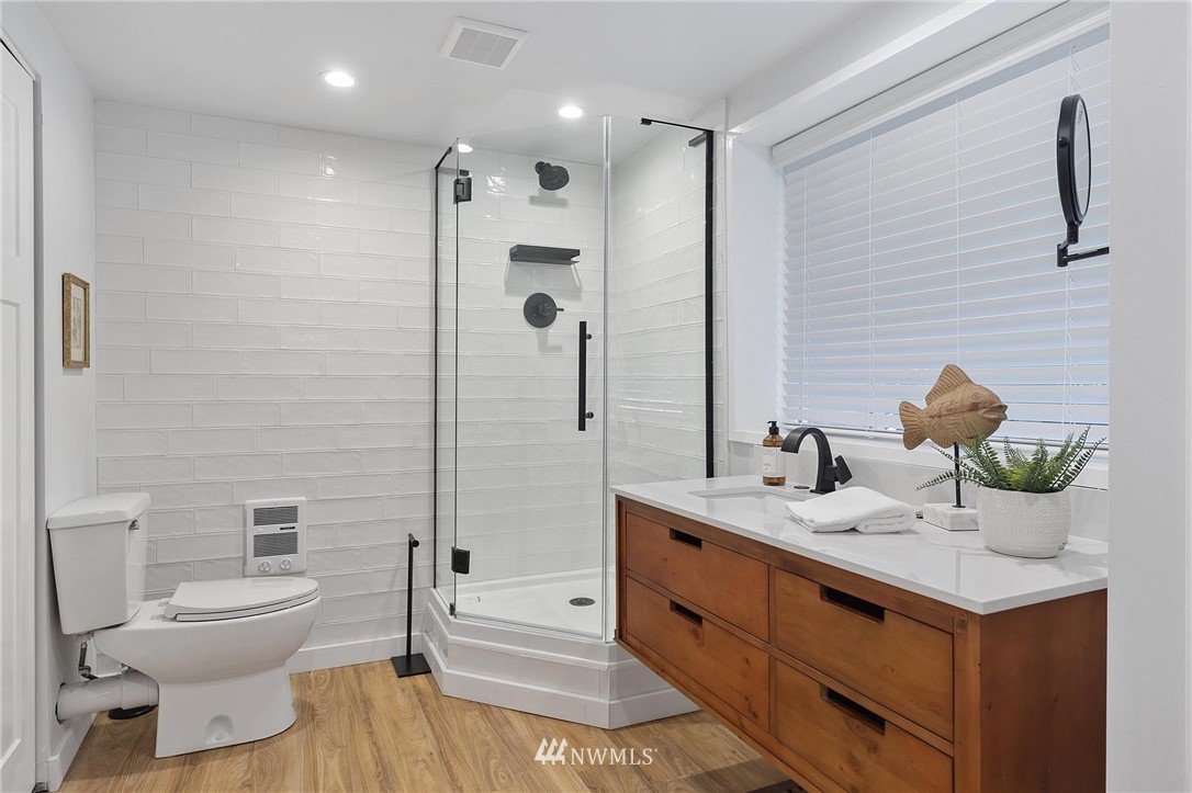 4411 Sunset Beach Road West University Place, WA 98466 - Photo 24 of 39 a bathroom with a sink toilet and shower