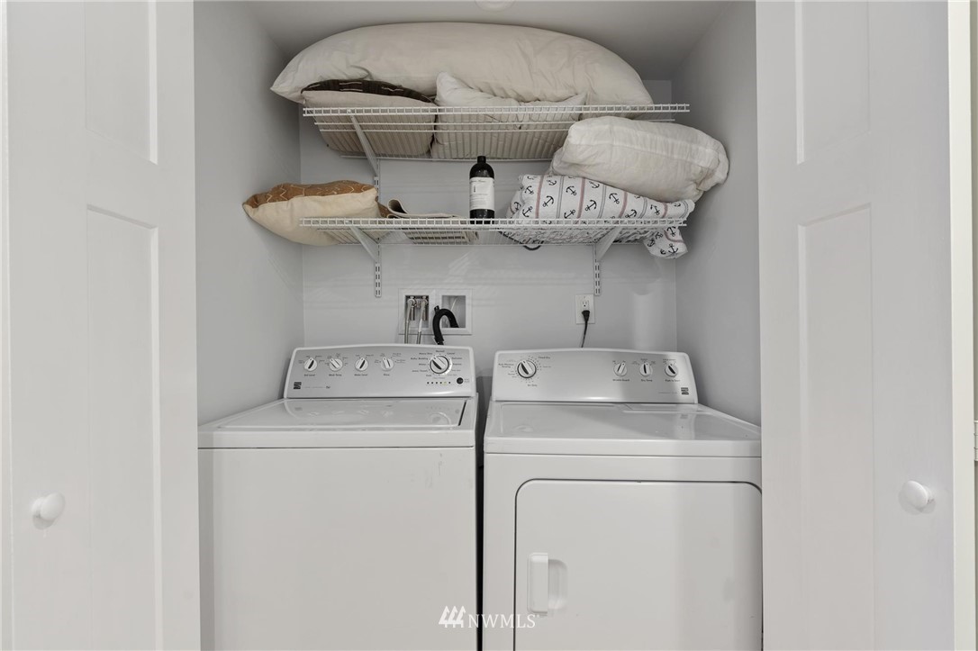 4411 Sunset Beach Road West University Place, WA 98466 - Photo 26 of 39 a utility room with dryer and washer