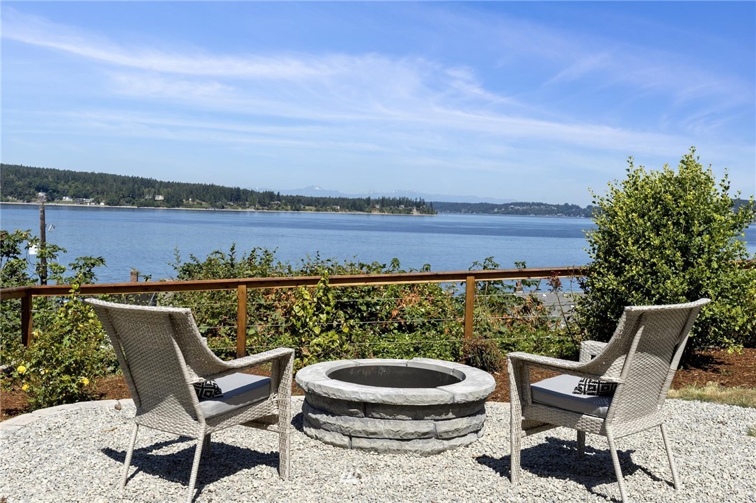 4411 Sunset Beach Road West University Place, WA 98466 - Photo 34 of 39 a view of a balcony with furniture and city view