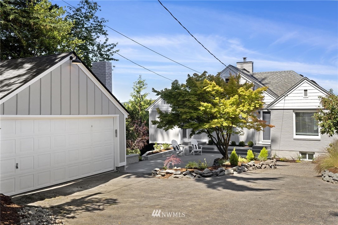 4411 Sunset Beach Road West University Place, WA 98466 - Photo 5 of 39 a house view with a outdoor space