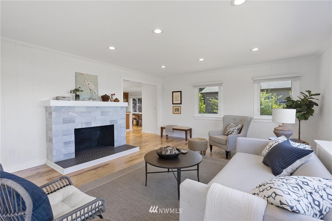 4411 Sunset Beach Road West University Place, WA 98466 - Photo 10 of 39 a living room with furniture and a fireplace