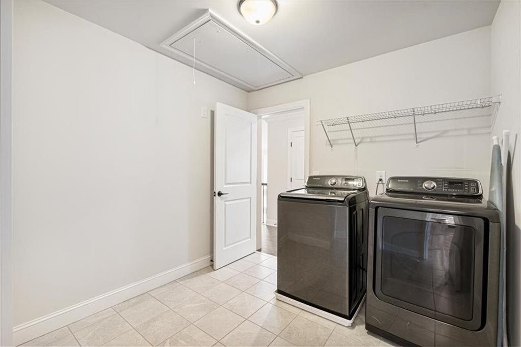 947 Hunter Way Milton, GA 30004 - Photo 57 of 78 a utility room with wooden floor washer and dryer