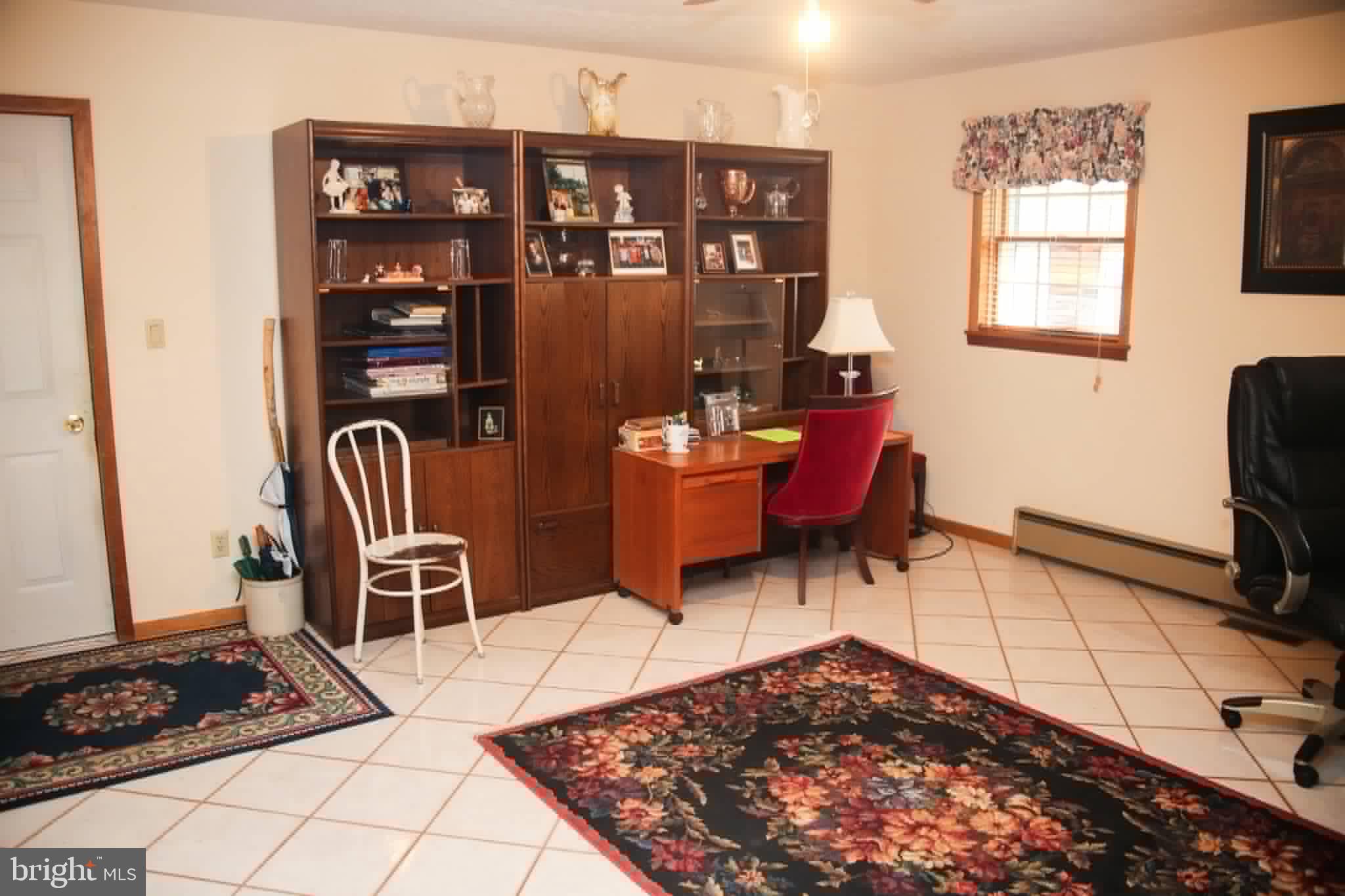 1740 Old Crellin Road Oakland, MD 21550 - Photo 12 of 28 a bedroom with furniture and a rug