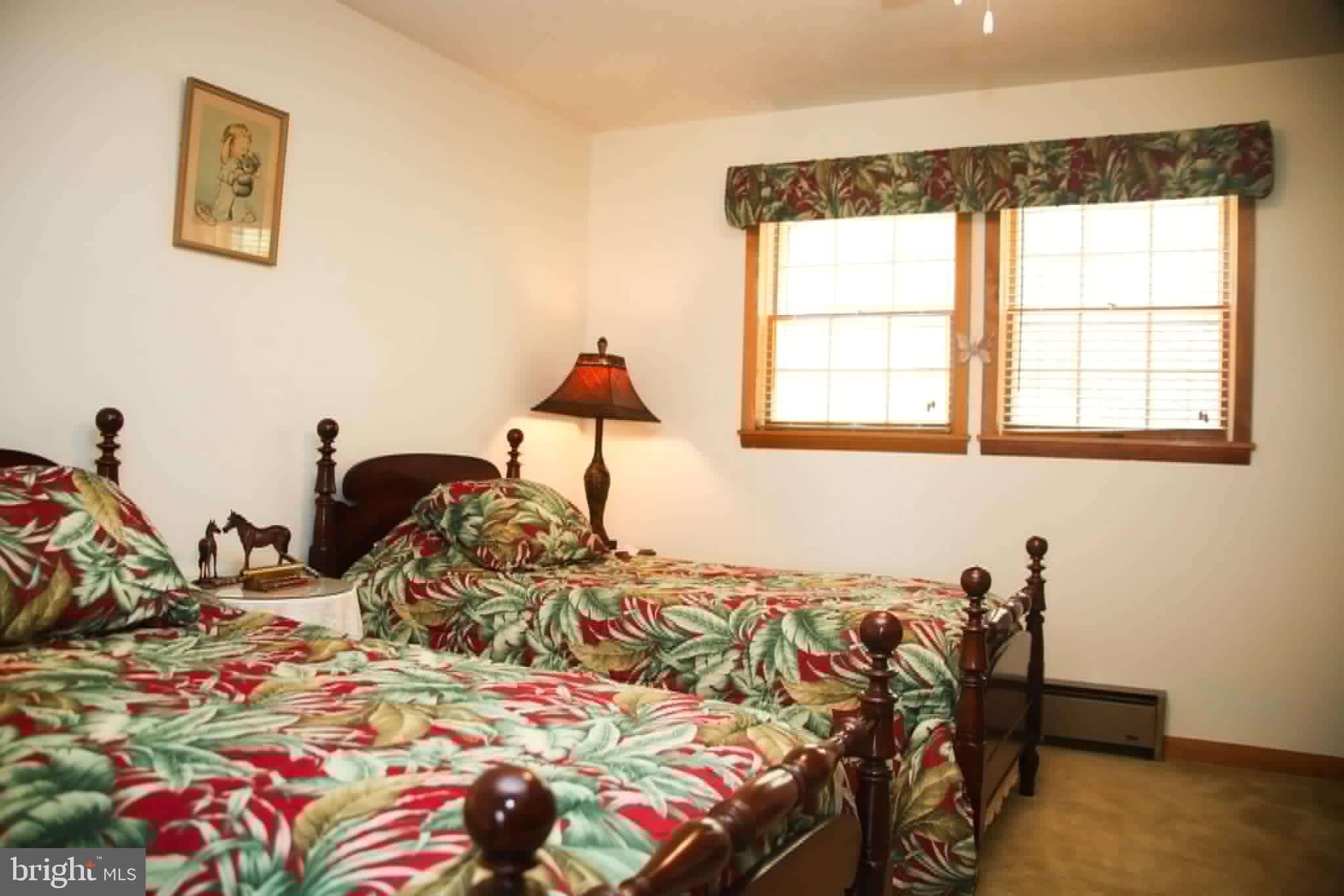 1740 Old Crellin Road Oakland, MD 21550 - Photo 18 of 28 a bedroom with a bed and a window
