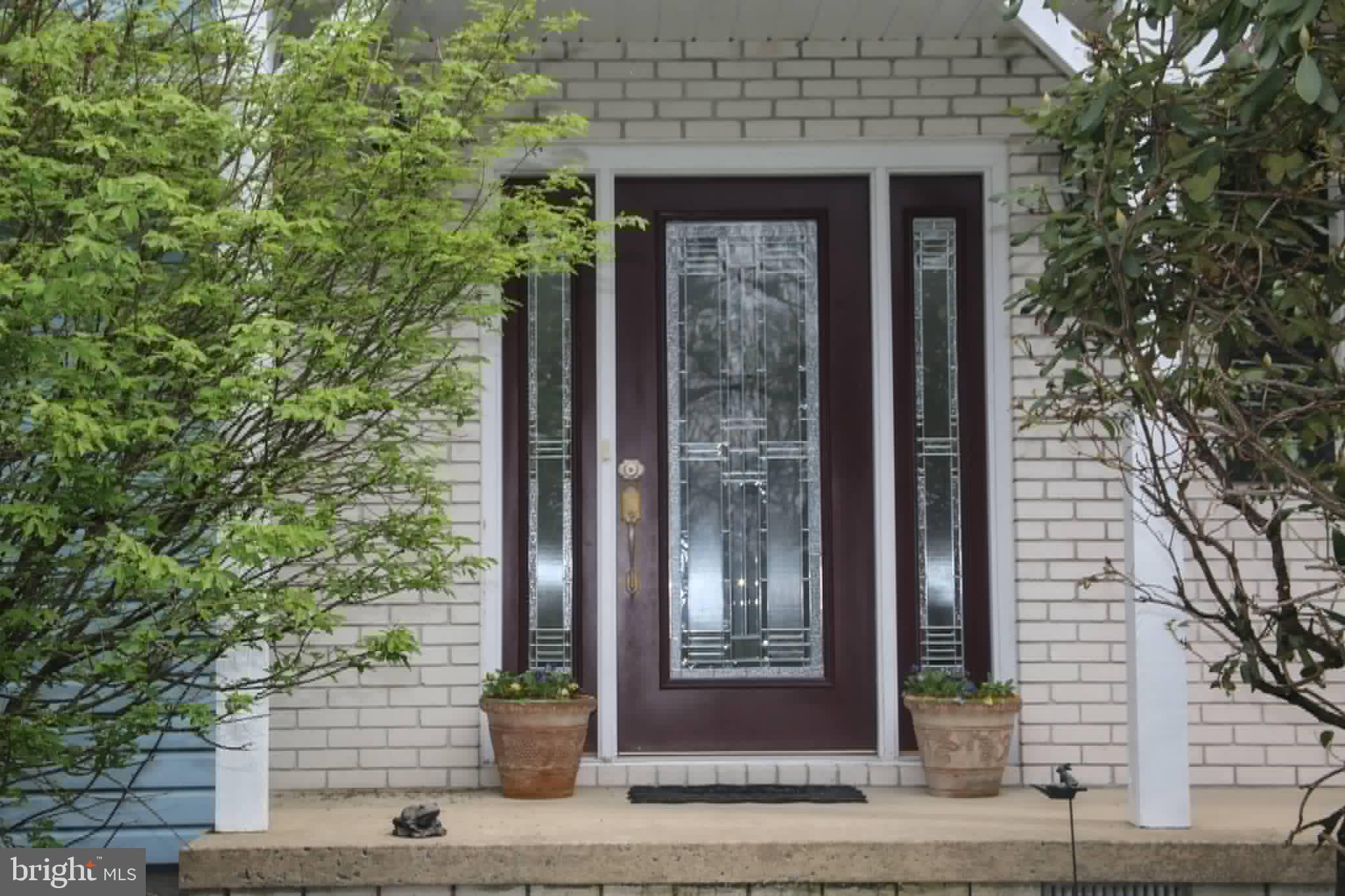 1740 Old Crellin Road Oakland, MD 21550 - Photo 25 of 28 a front view of a house with a tree