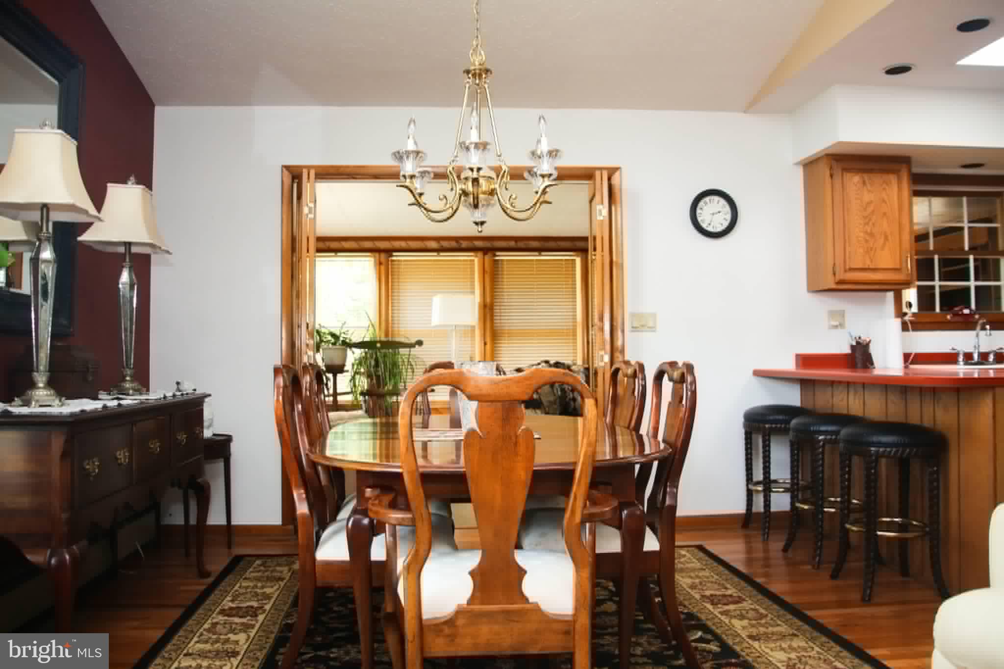1740 Old Crellin Road Oakland, MD 21550 - Photo 6 of 28 a view of a dining room with furniture window and wooden floor