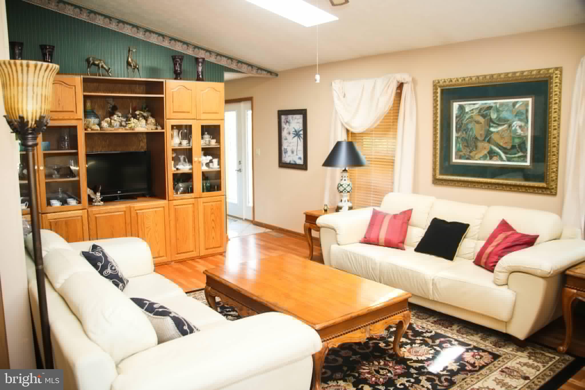 1740 Old Crellin Road Oakland, MD 21550 - Photo 10 of 28 a living room with furniture and a flat screen tv