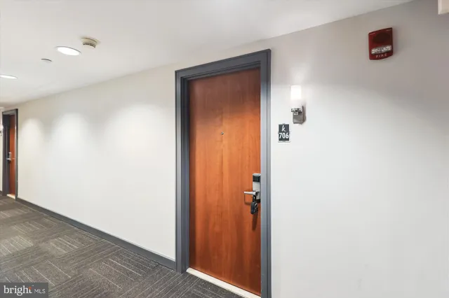 a view of a hallway with closet