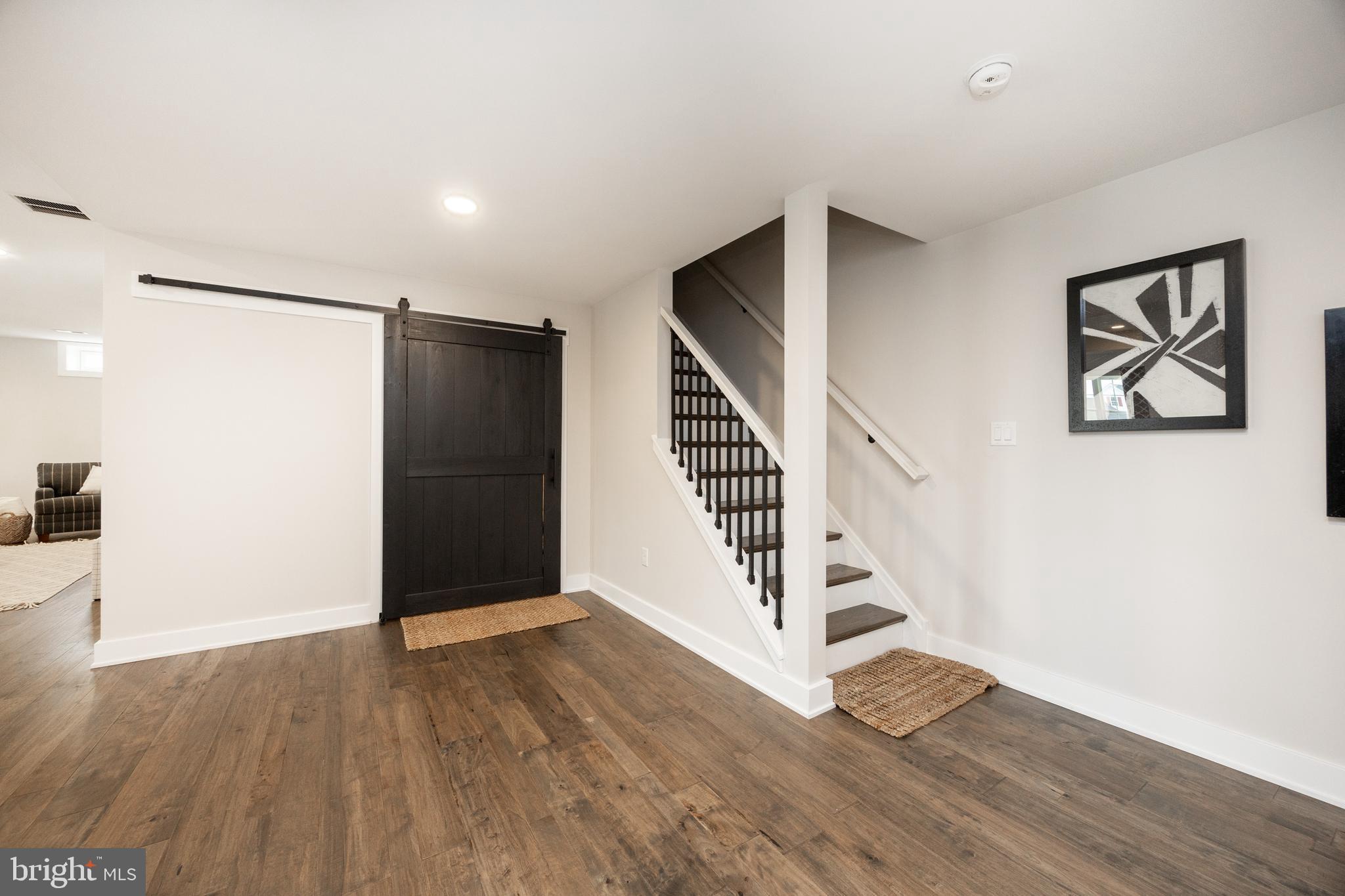 609 Metal Street Phoenixville, PA 19460 - Photo 32 of 42 Lower Level Stairs and Barn Door