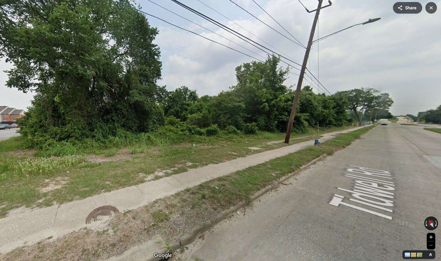 0 Crofton Street Houston, TX 77016 - Photo 2 of 6 a view of a street