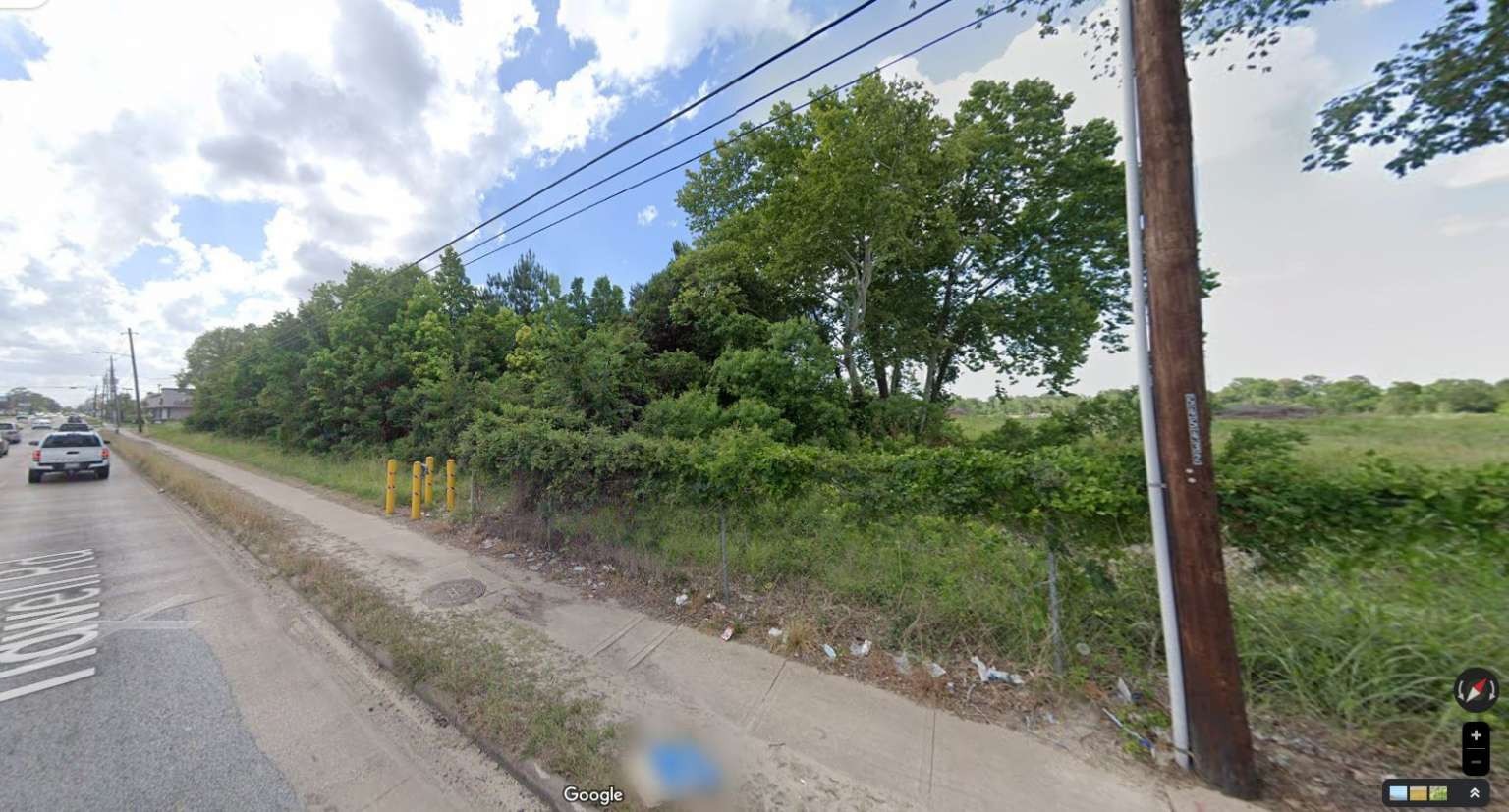 0 Crofton Street Houston, TX 77016 - Photo 5 of 6 a view of a yard with potted plants