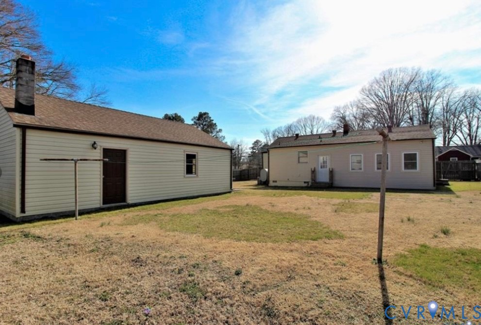 1507 Miles Hopewell, VA 23860 - Photo 2 of 2 a front view of a house with a yard and garage