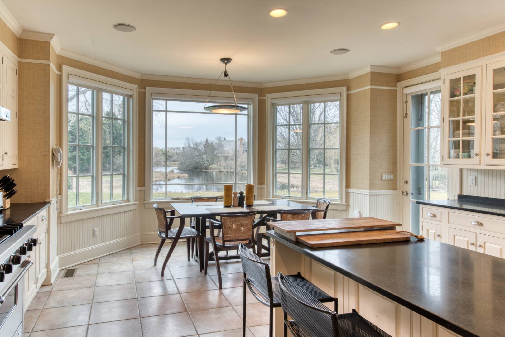 181 Parsonage Pond Road Sagaponack, NY 11962 - Photo 14 of 25 a room with gym equipment and large windows