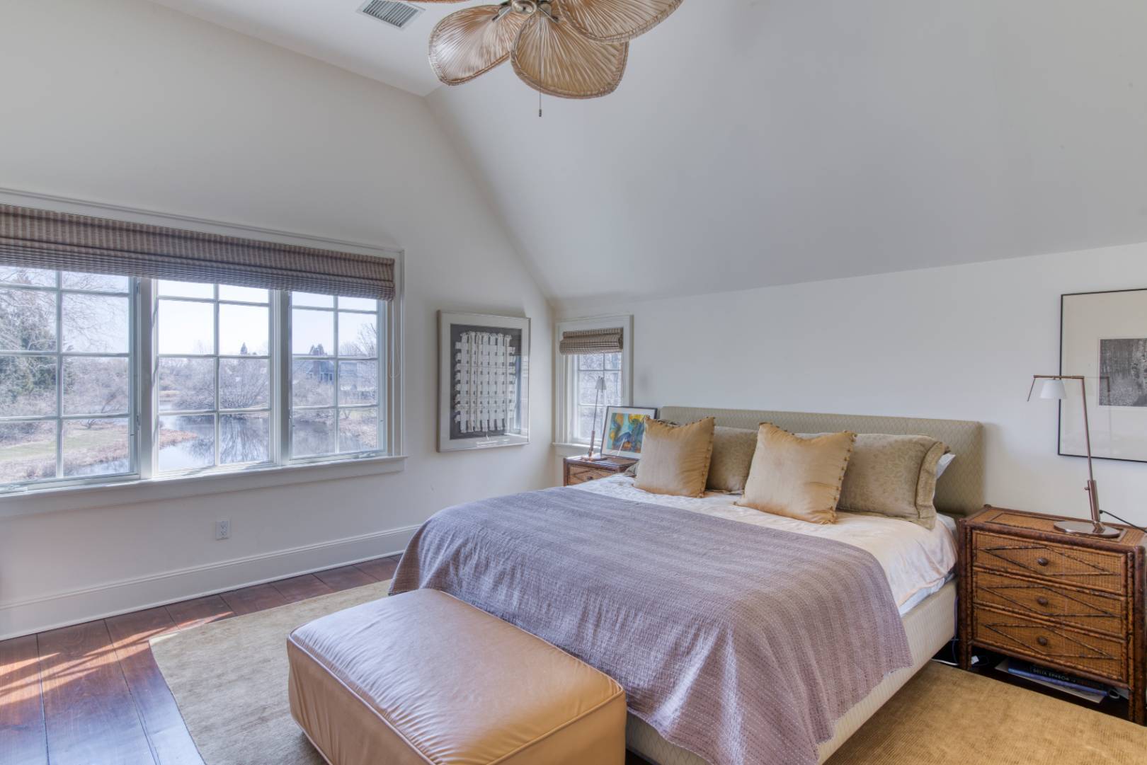 181 Parsonage Pond Road Sagaponack, NY 11962 - Photo 21 of 25 a bedroom with a large bed and a window