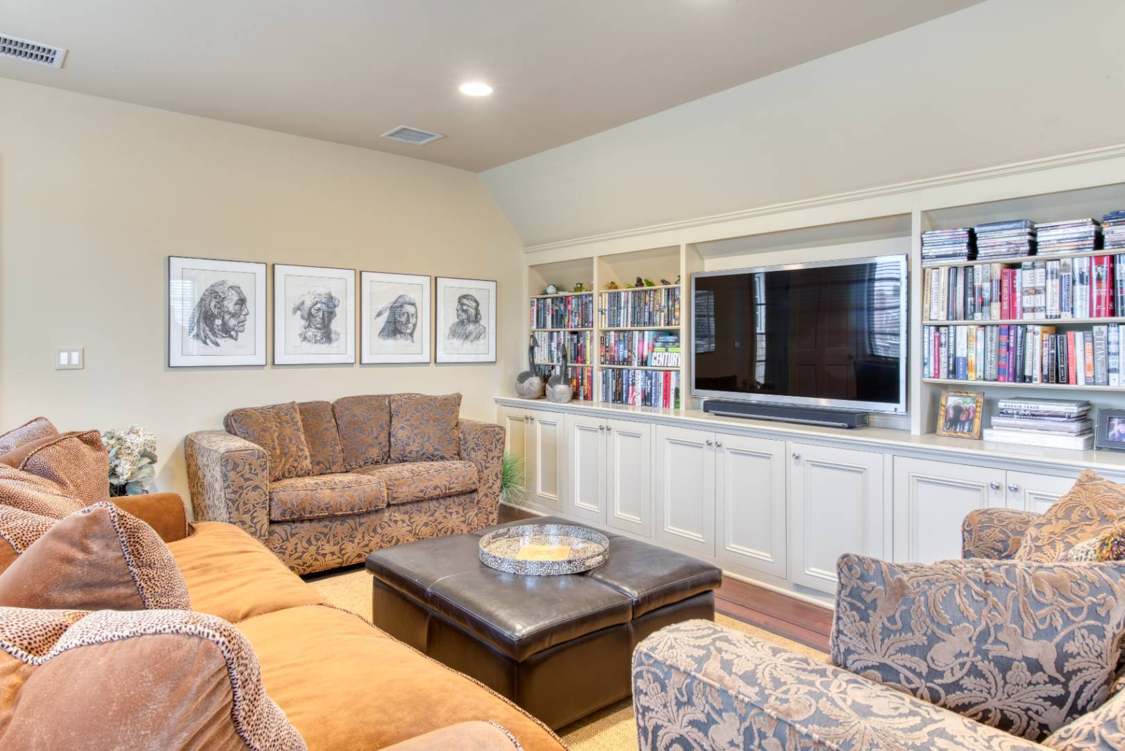181 Parsonage Pond Road Sagaponack, NY 11962 - Photo 24 of 25 a living room with furniture and a flat screen tv
