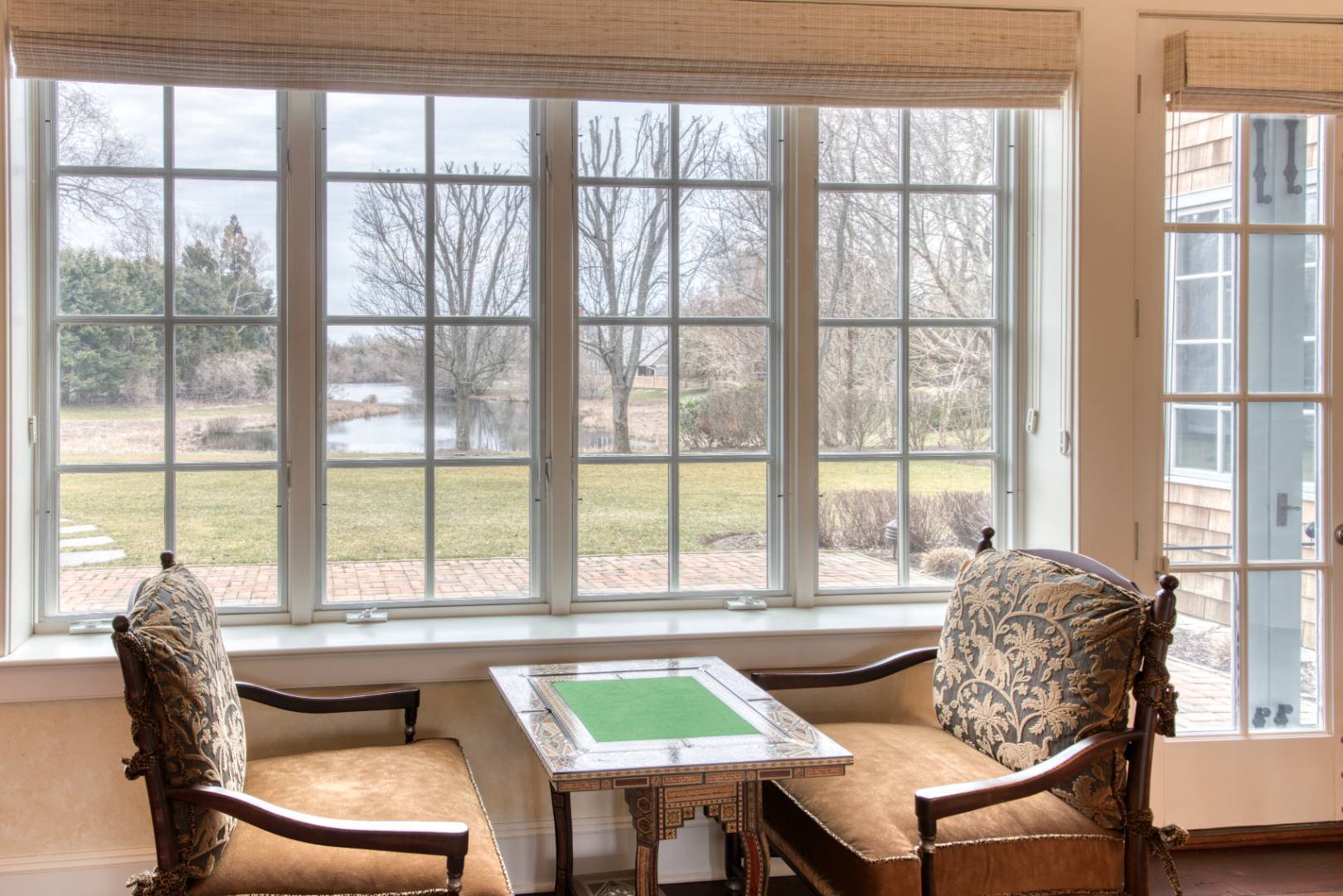 181 Parsonage Pond Road Sagaponack, NY 11962 - Photo 25 of 25 a living room with furniture and a window