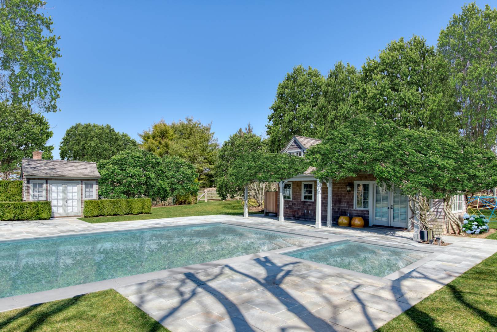 181 Parsonage Pond Road Sagaponack, NY 11962 - Photo 5 of 25 front view of a house with a yard