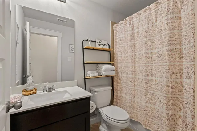 a view of a room with baby crib