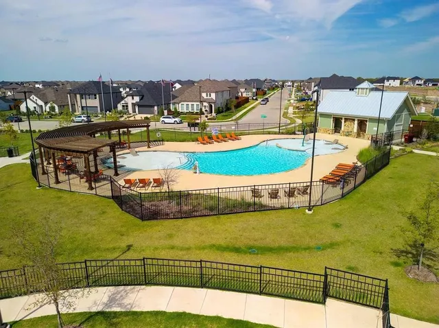 a swimming pool with outdoor view