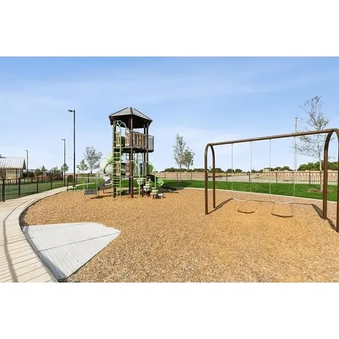 a view of a golf course with a garden