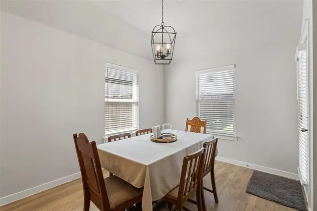 a living room with furniture fireplace and flat screen tv
