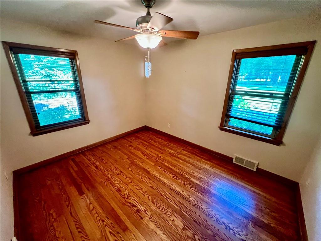 963 Kings Chapel Road New Castle, PA 16105 - Photo 22 of 27 a view of a room with a ceiling fan and a window