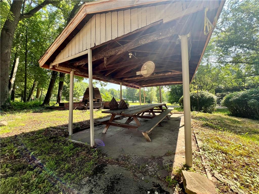 963 Kings Chapel Road New Castle, PA 16105 - Photo 10 of 27 a view of a backyard with sitting area