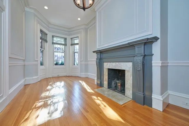 a view of an empty room and window