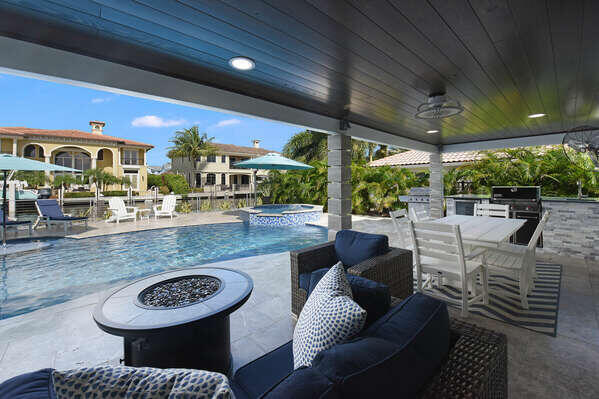 839 Enfield Street Boca Raton, FL 33487 - Photo 22 of 36 a living room with furniture and a large window
