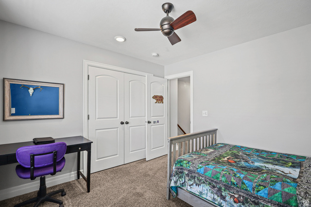 1588 West Rim Rock Drive Stockton, UT 84071 - Photo 25 of 61 Neutral-toned carpeting paired with light grey wall paint