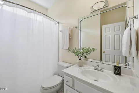 a view of a hallway with closet area