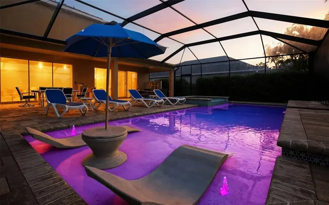 a view of an outdoor space with swimming pool