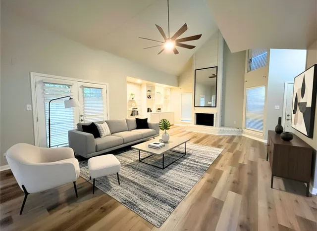 a kitchen with stainless steel appliances kitchen island granite countertop a sink and stove top oven