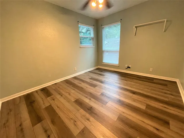 a view of backyard with a garden and stairs