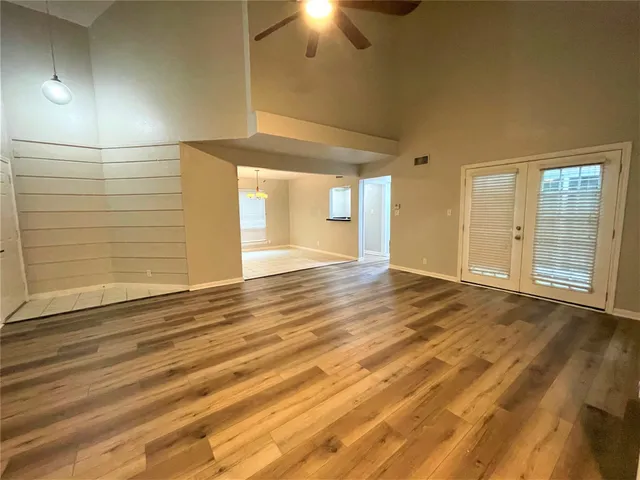 a close view of a sink a faucet and window in a room