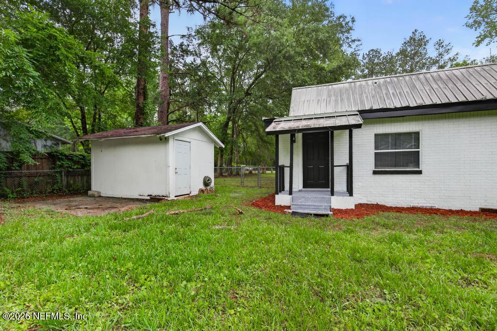 43739 Ratliff Road Callahan, FL 32011 - Photo 51 of 55 a view of a house with backyard and garden