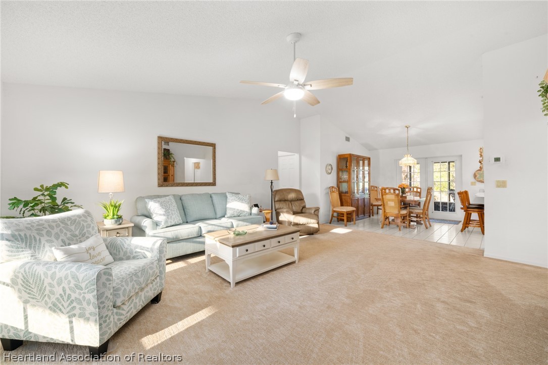 5802 Golden Road Sebring, FL 33875 - Photo 5 of 37 a living room with furniture and white walls