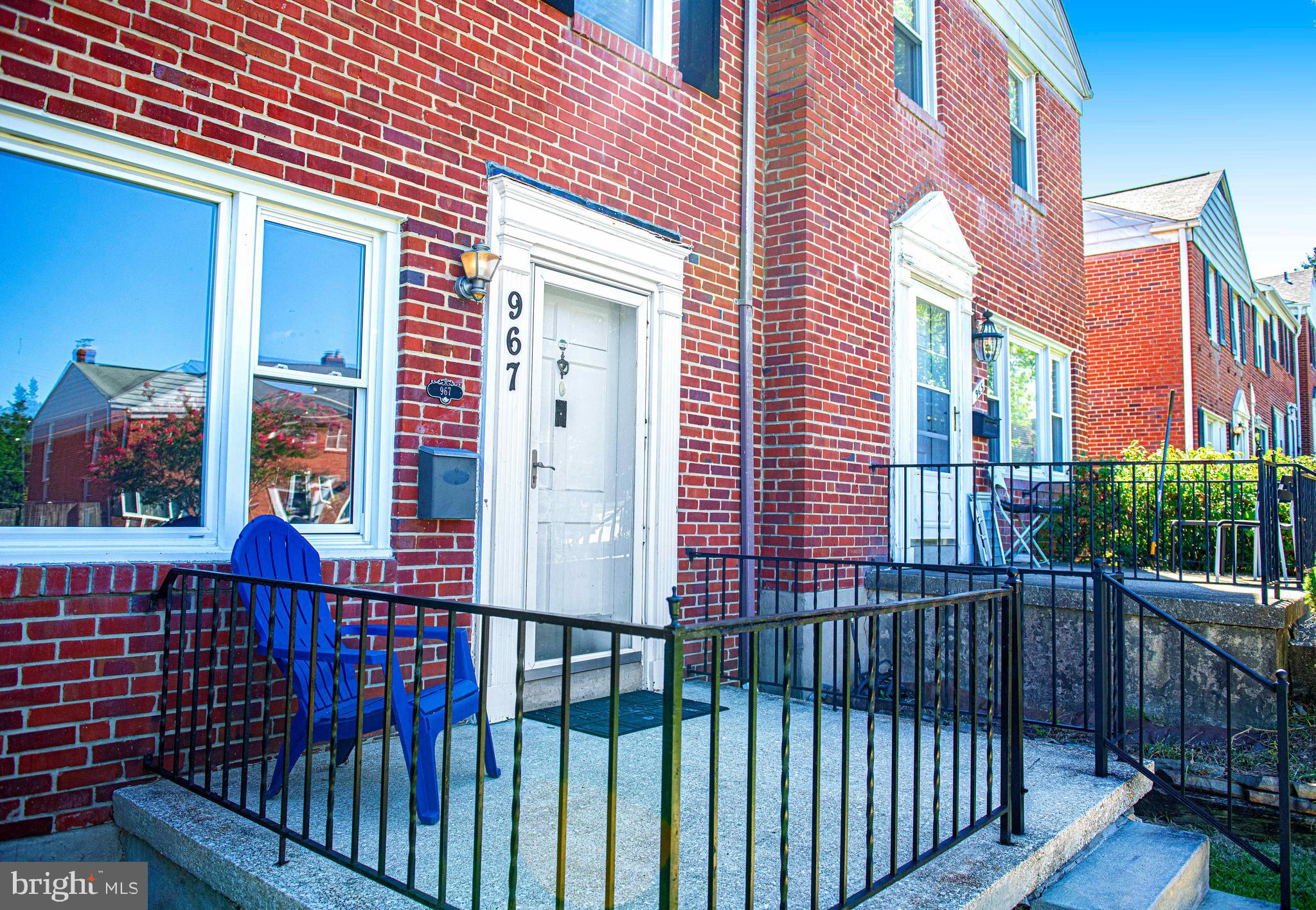 967 Radcliffe Road Baltimore, MD 21204 - Photo 2 of 26 a view of a brick building from a balcony
