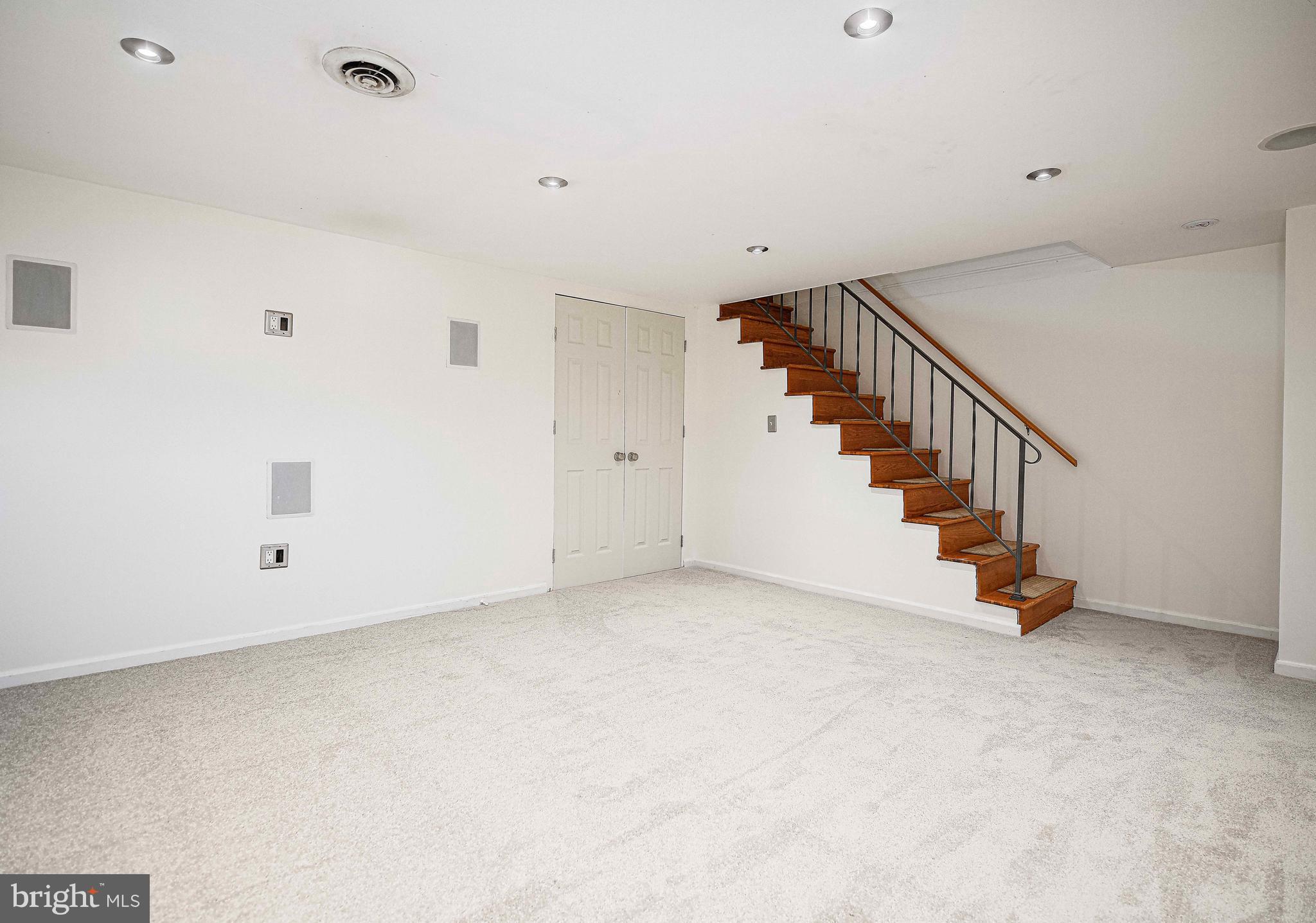 967 Radcliffe Road Baltimore, MD 21204 - Photo 24 of 26 a view of an empty room with stairs