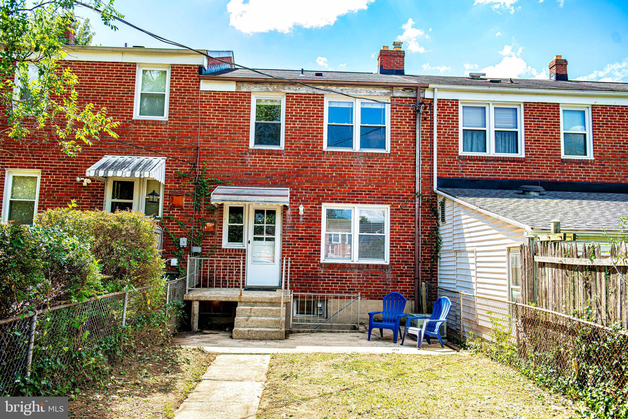 967 Radcliffe Road Baltimore, MD 21204 - Photo 25 of 26 a front view of a house with a yard
