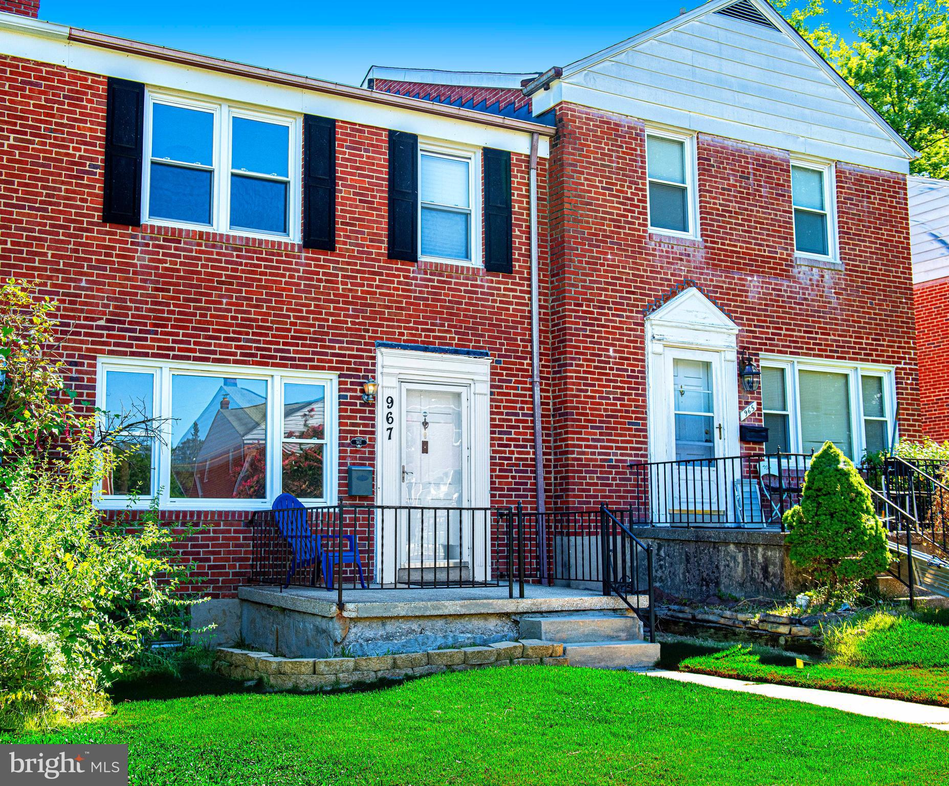 967 Radcliffe Road Baltimore, MD 21204 - Photo 4 of 26 a view of front of a brick house with a yard