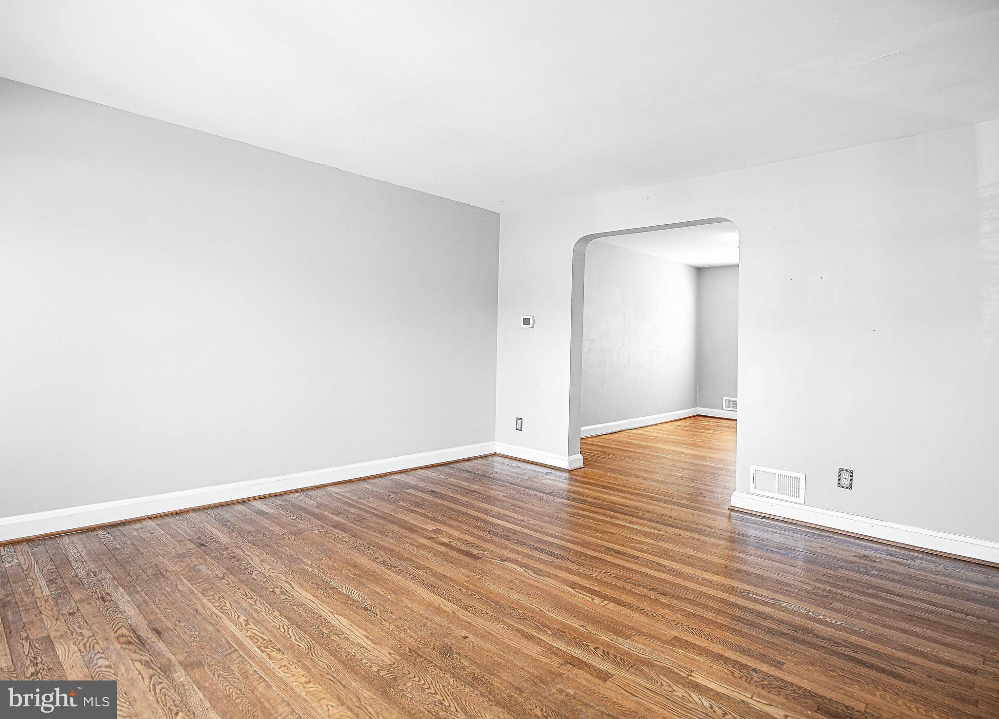 967 Radcliffe Road Baltimore, MD 21204 - Photo 7 of 26 wooden floor in an empty room