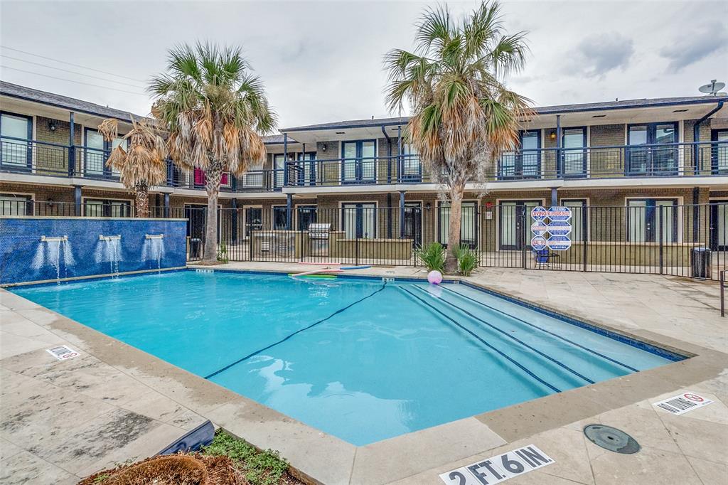 7770 Meadow Road, Unit 115 Dallas, TX 75230 - Photo 11 of 12 a front view of building with yard