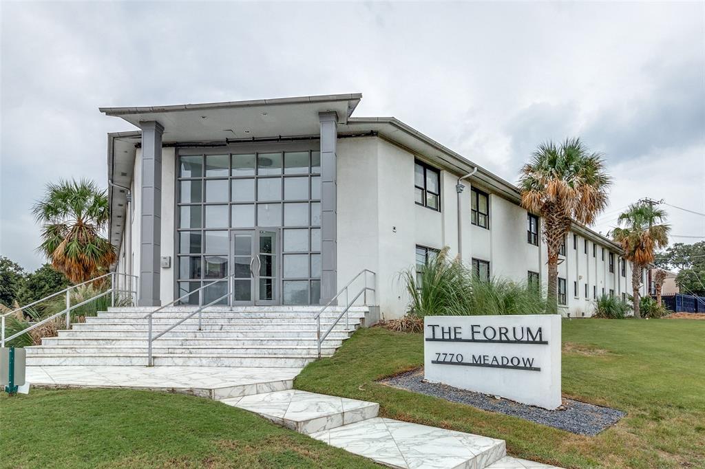 7770 Meadow Road, Unit 115 Dallas, TX 75230 - Photo 12 of 12 a front view of a house with garden