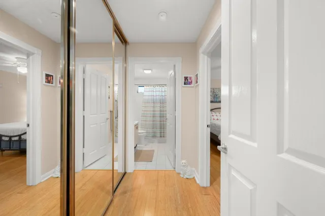 a bathroom with a tub and shower