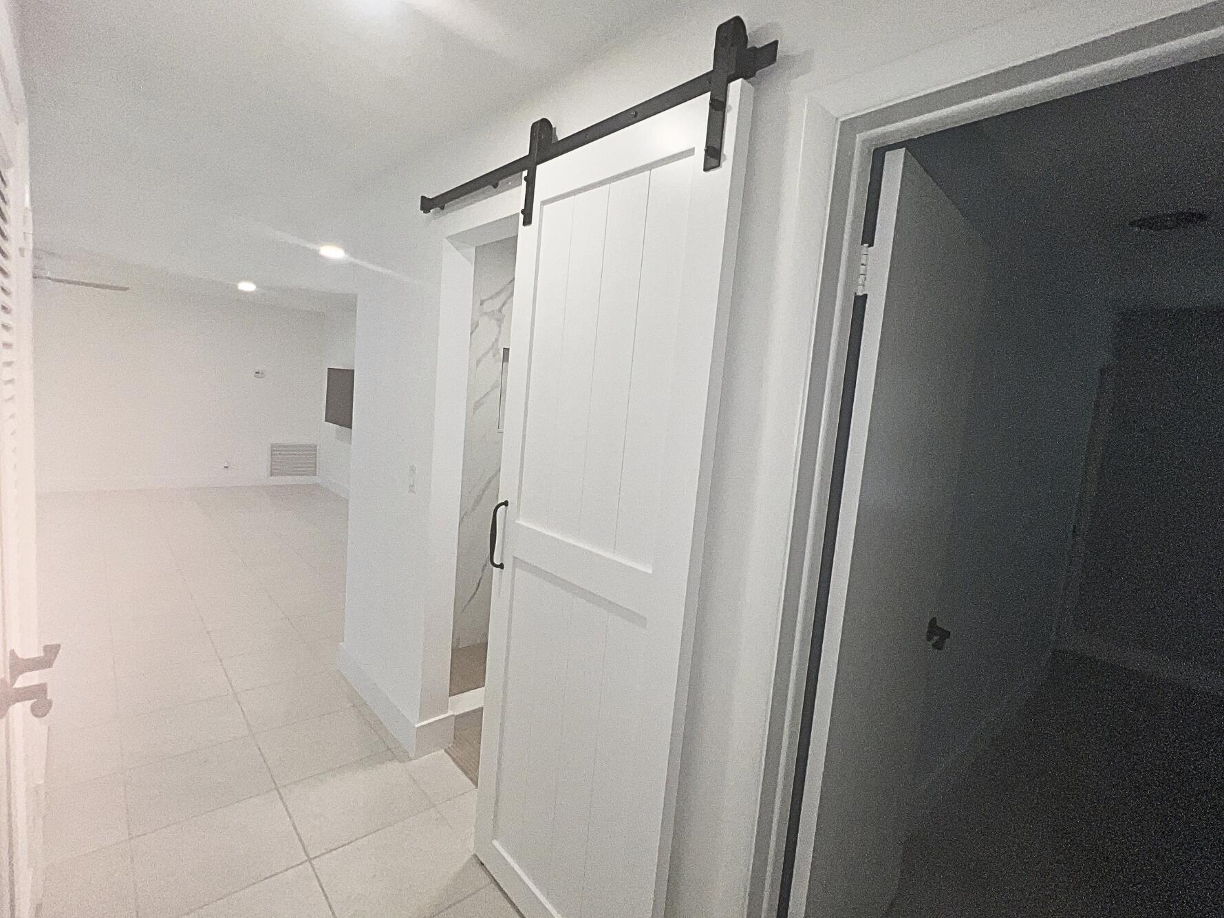 1260 Manor Drive Riviera Beach, FL 33404 - Photo 19 of 56 Guest Bath Entry hallway
